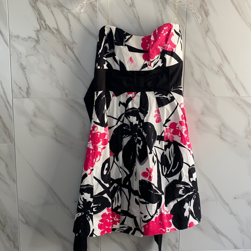 black white and pink dress with bow detail